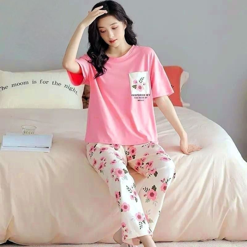 Pink floral printed pajama set with short-sleeve top and matching floral pants