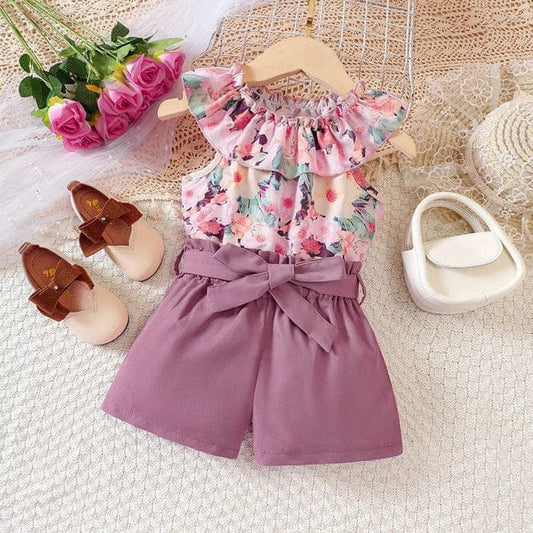 Floral printed ruffle top with purple bow and matching purple shorts outfit