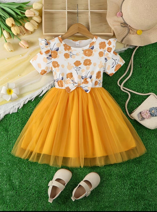 White floral bodice with orange print and yellow tulle princess skirt