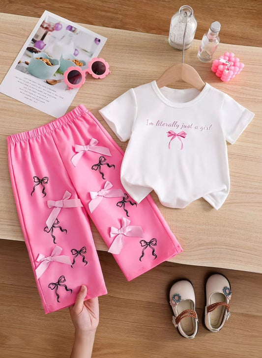 Pink bow set with white T-shirt featuring pink bow text and matching ribbon shorts