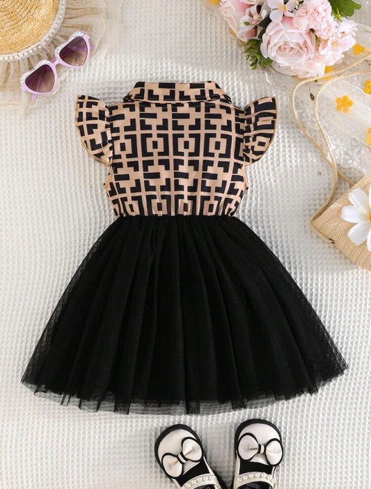 Girls black tulle party dress with geometric patterned bodice and bow-tie