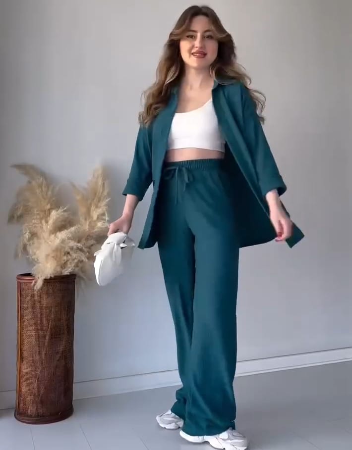 Bottle green 2-piece button co-ord: open shirt with matching drawstring pants.