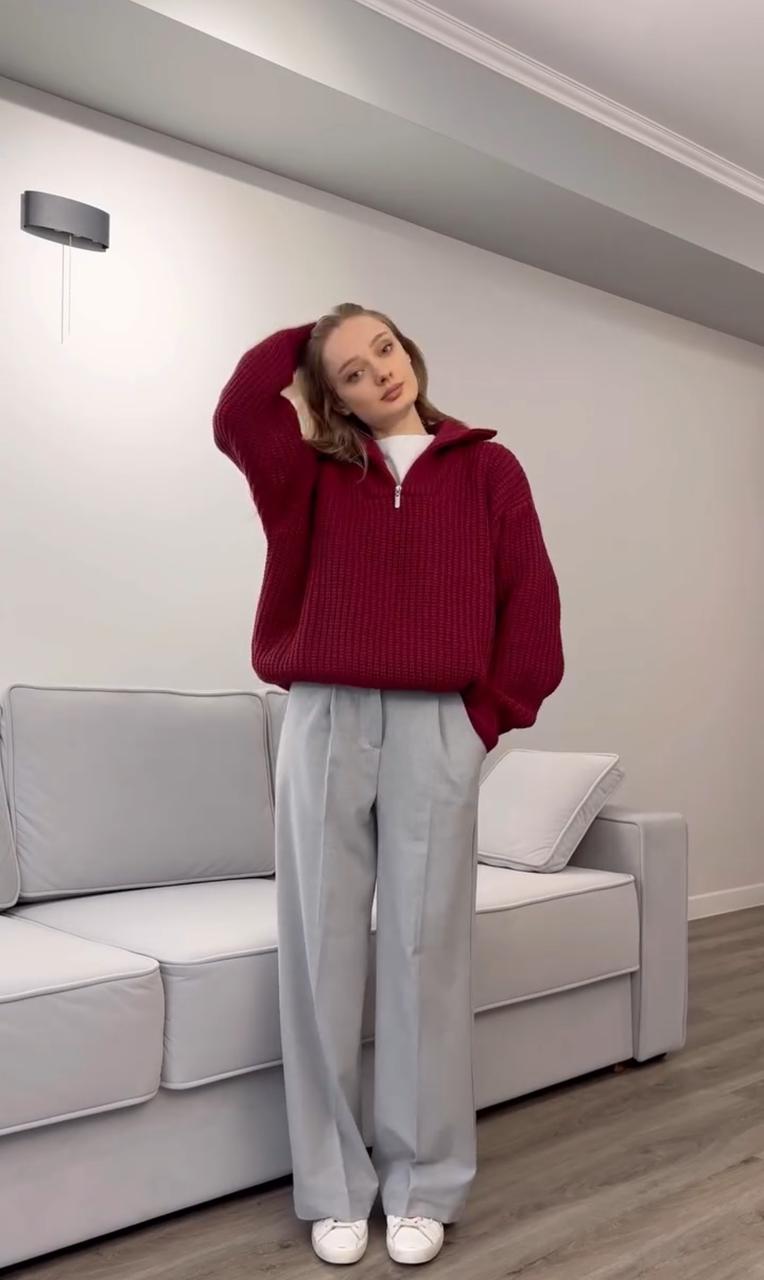 Burgundy drop-shoulder knit sweater with ribbed collar, cuffs, and hem