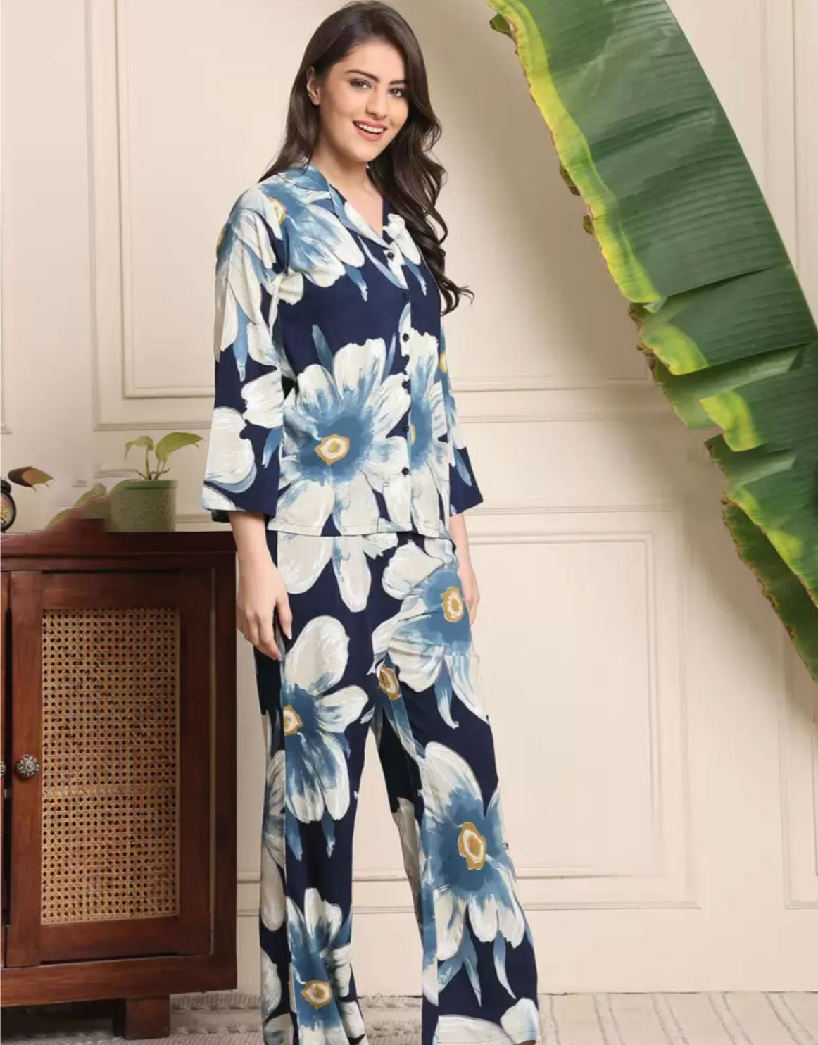 Women’s floral co-ord set: navy top and wide-leg pants with blue-white blooms