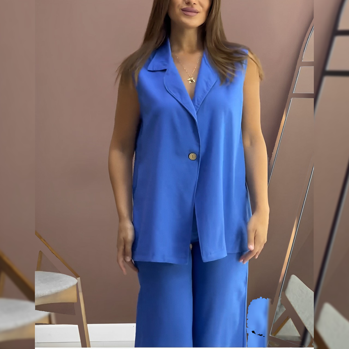 Sleeveless co-ord set with royal blue button-up sleeveless top and matching wide-leg pants
