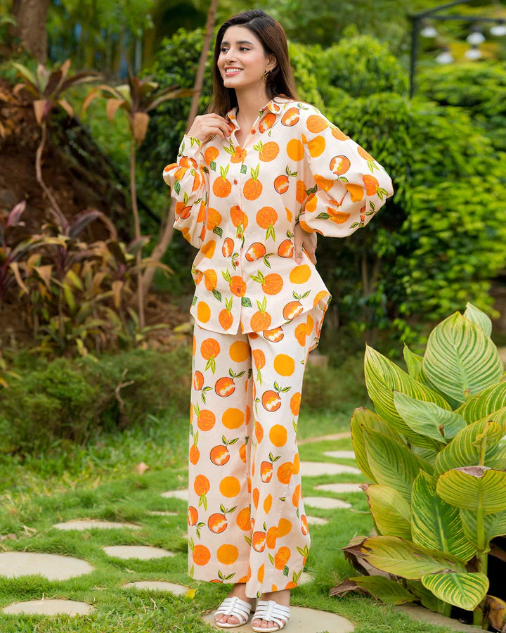 KAREN co-ord set with orange and green fruit pattern, loose long sleeves and matching pants