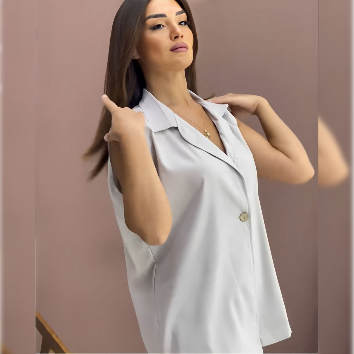 Sleeveless co-ord set with light satin button-up top and matching wide-leg pants