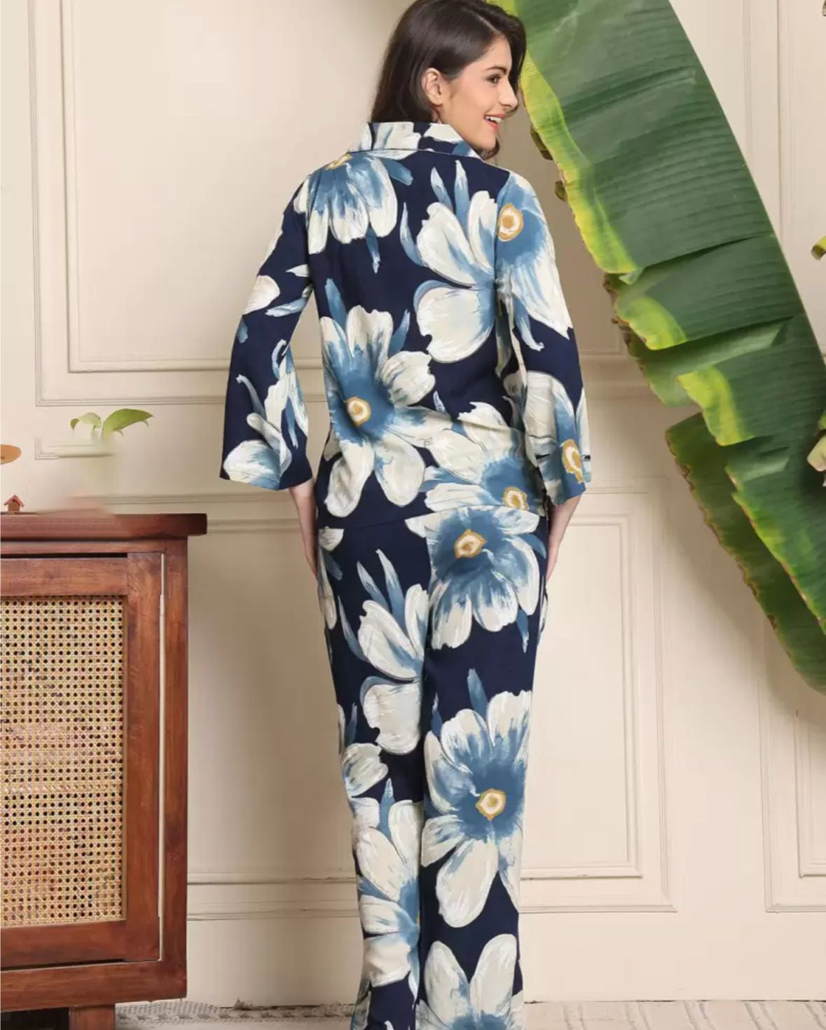 Navy floral co-ord set, matching shirt and long pants with blue-white flower print