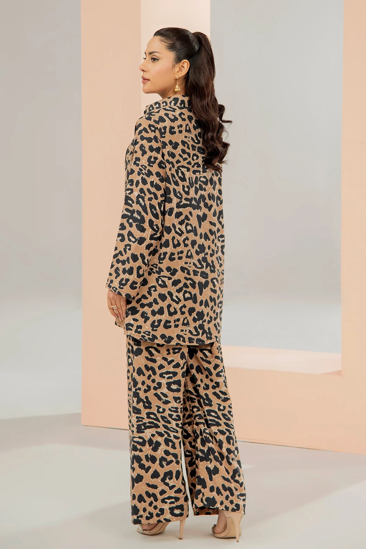 Leopard print 3-piece set with long coat and wide-leg pants, side view in beige