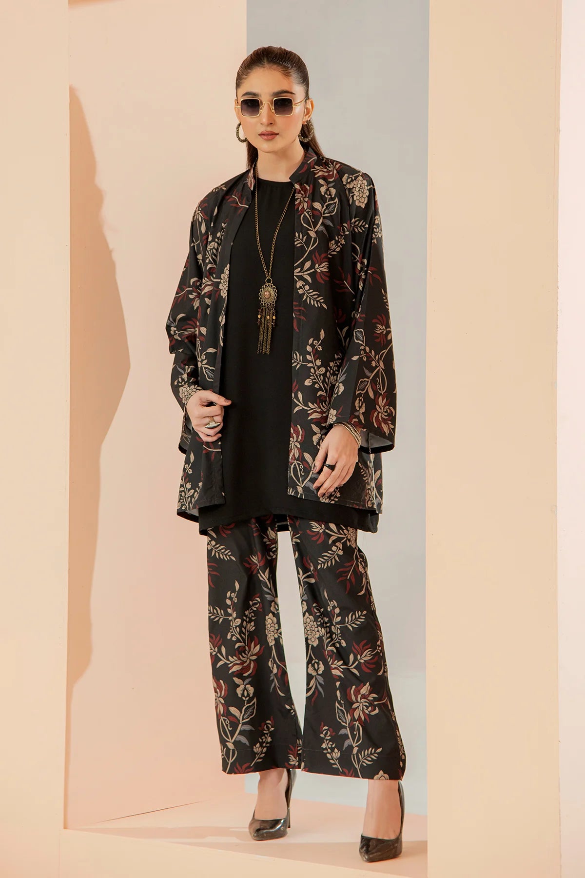 Floral black long jacket set with black top and matching tapered pants