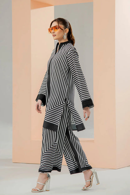Black-and-white striped crepe tunic and wide-leg pants set, side view with full length