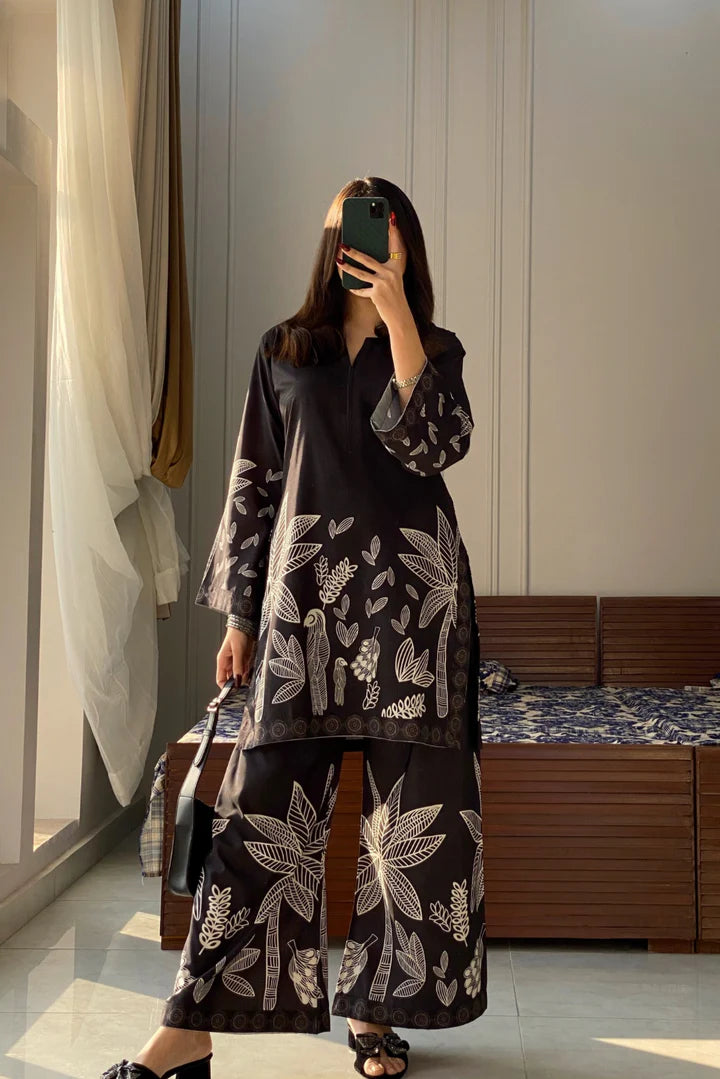 Black floral long kurta with flared hem and matching wide-leg pants, full outfit
