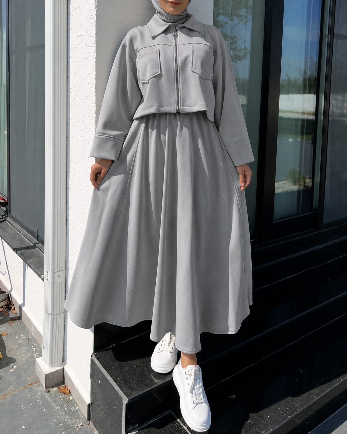 Light gray long maxi winter outfit with zip-up fleece jacket and gathered skirt