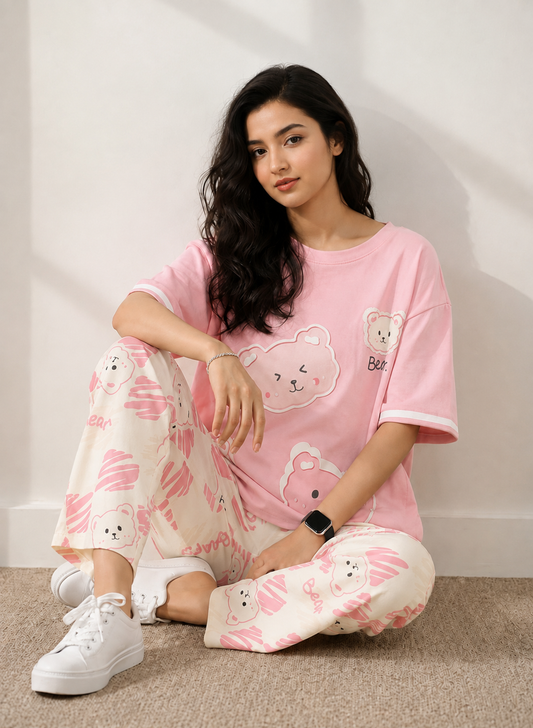 Pink bear lounge set with matching T-shirt and pajama pants, cartoon cloud print