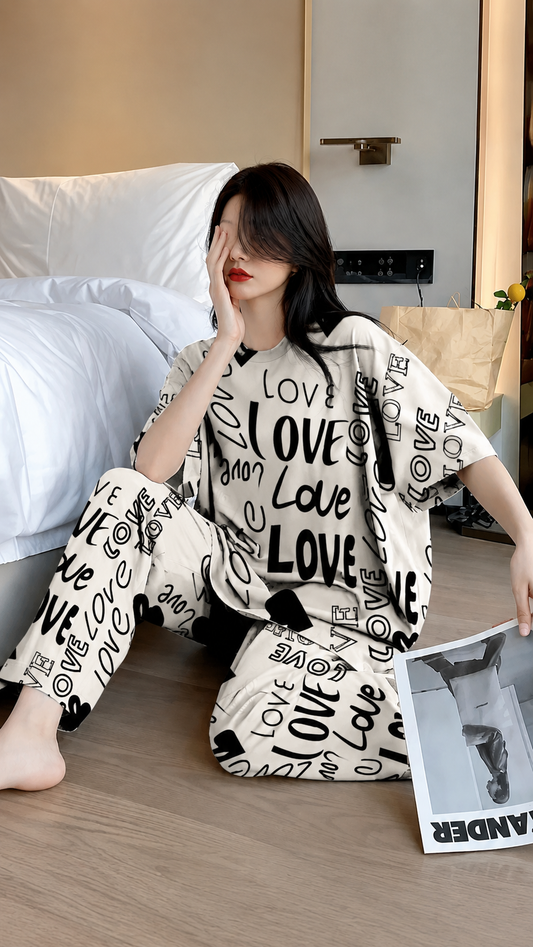 White lounge set with black LOVE letterprint, short-sleeve top and matching shorts