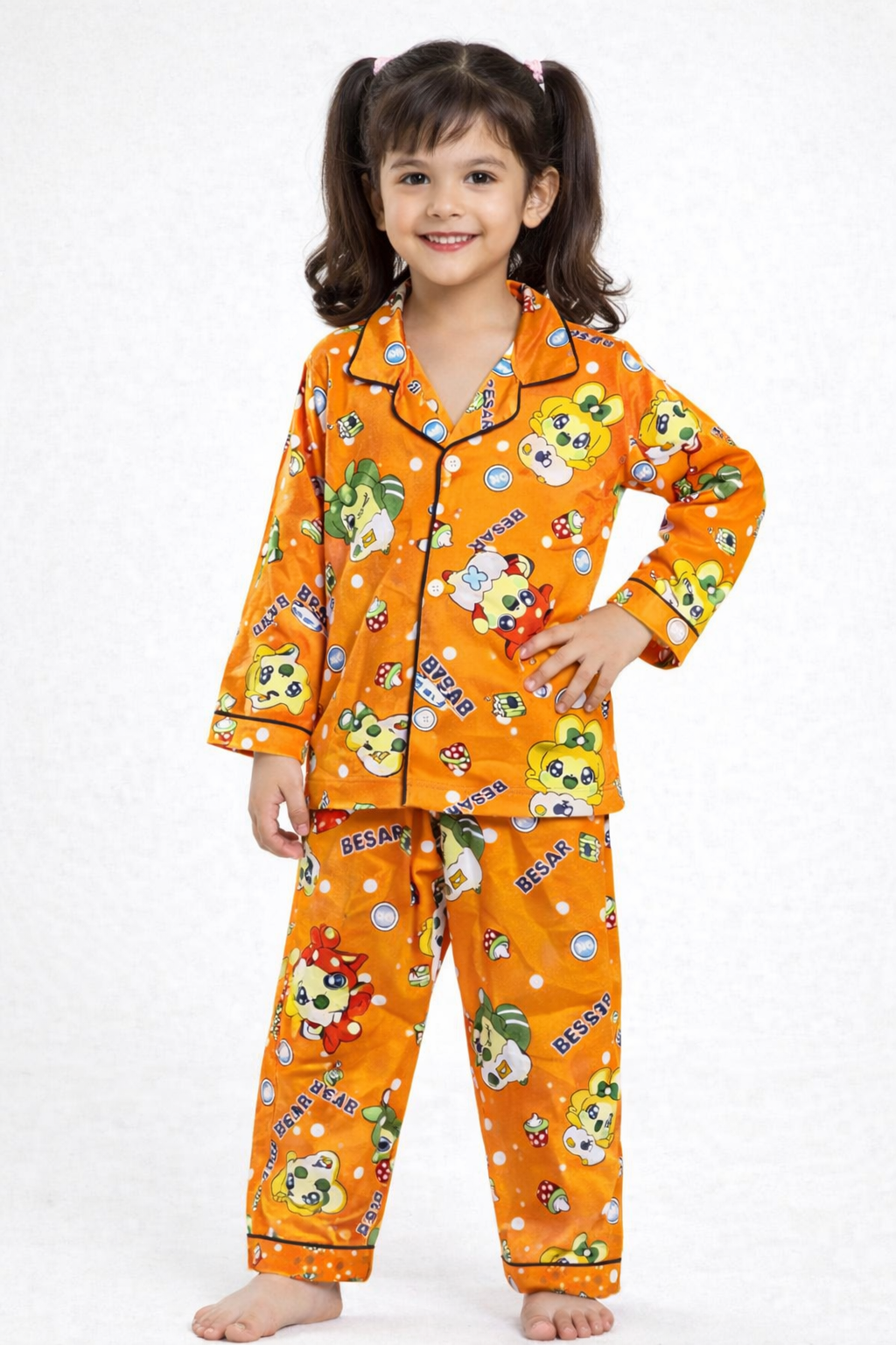 Girls orange cartoon print 2-piece pajama set with button-up top and matching pants