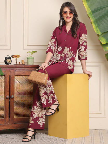 Wine-red floral co-ord set with button-front kurta and patterned wide-leg trousers