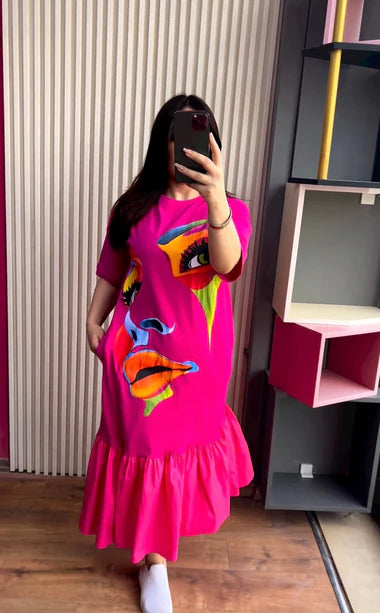 Pink printed frill long tee dress with colorful face graphic and ruffled hem
