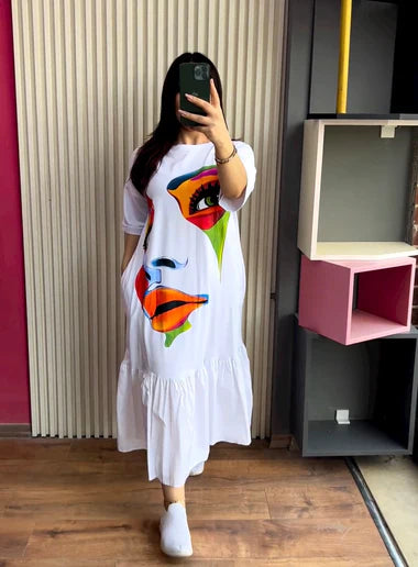 White printed frill long tee dress with colorful face graphic and ruffled hem