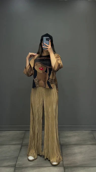 Gold silk-printed co-ord set with wide-leg pants and long-sleeve top