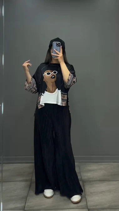 Black silk-printed co-ord set with wide-leg pants and long-sleeve top