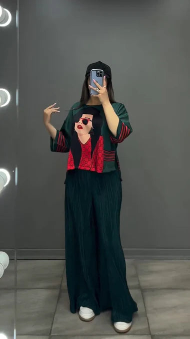 Green silk-printed co-ord set with wide-leg pants and long-sleeve graphic top
