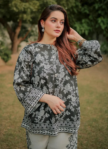 Printed kurta set with patterned cuffs and hem, paired with light-toned wide-leg pants