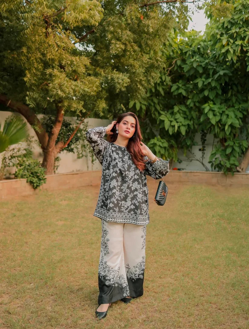 Printed long kurta and matching palazzo pants, dark top with white floral pattern
