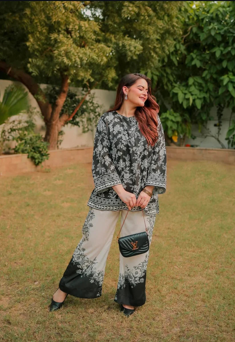 Floral co-ord set with dark kurta, 3/4 sleeves, and matching printed wide-leg pants