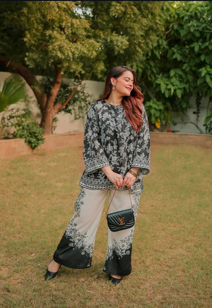 Floral co-ord set with dark kurta, 3/4 sleeves, and matching printed wide-leg pants