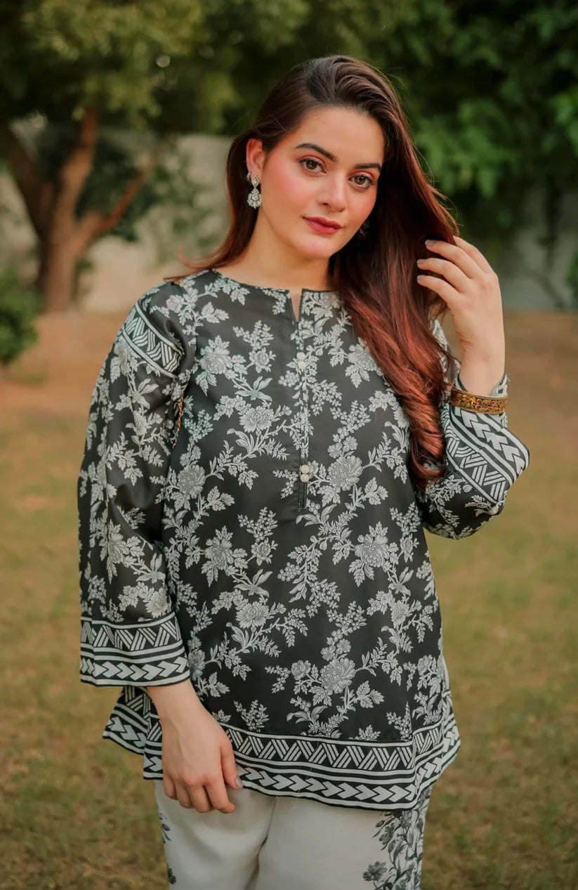 Floral co-ord set with dark printed kurta, 3/4 sleeves, and matching wide-leg pants
