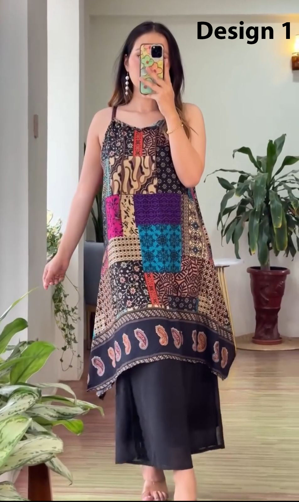 Sleeveless block-print kurti with multicolor patchwork panels and navy base, paired with palazzo