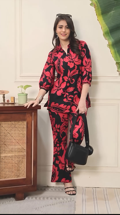 Black and red floral printed co-ord set with 3/4-sleeve top and wide-leg trousers