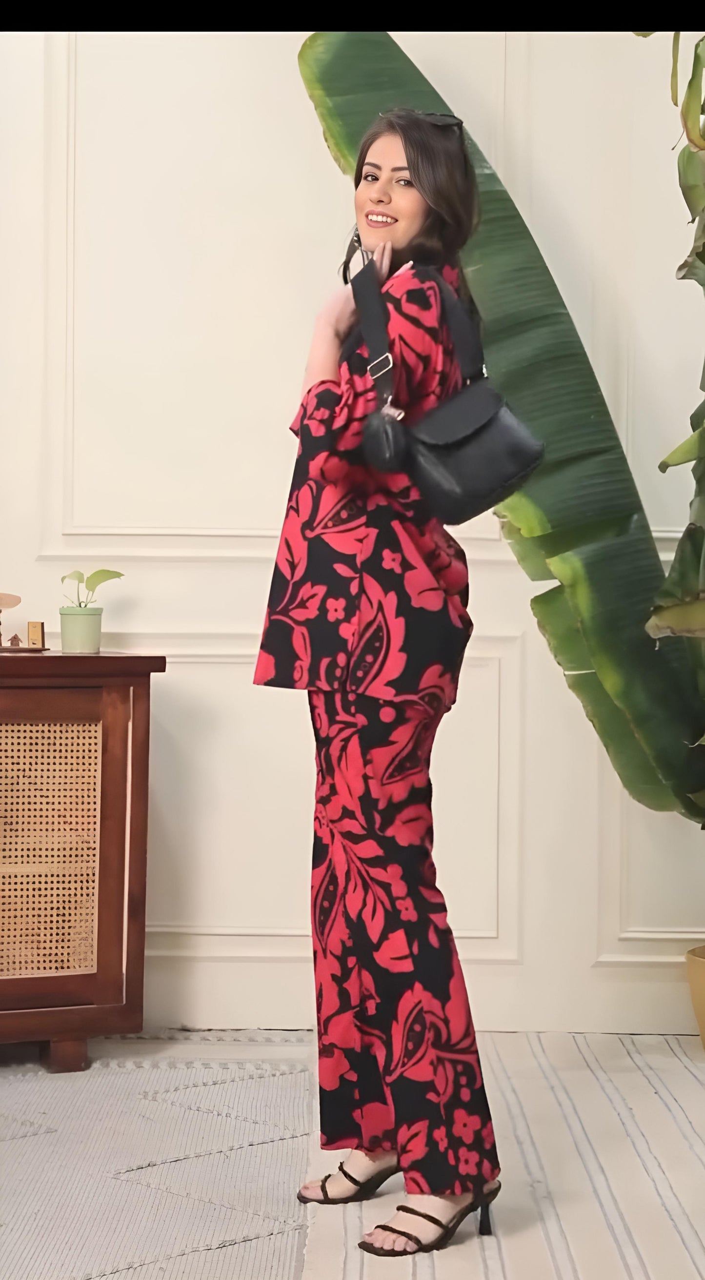Black and red floral printed co-ord set with button-front top and wide-leg pants