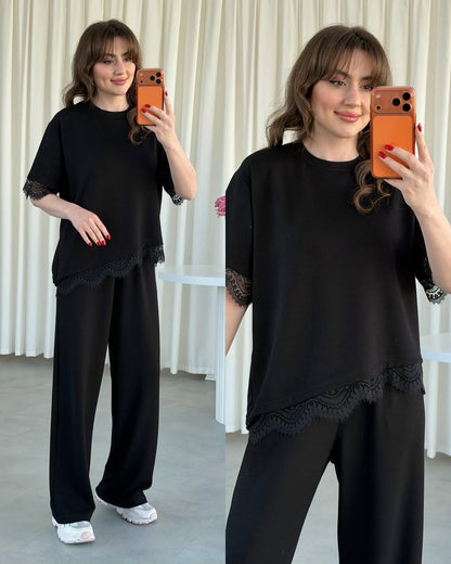 Black lace-trim pajama set with short-sleeve top and wide-leg pants