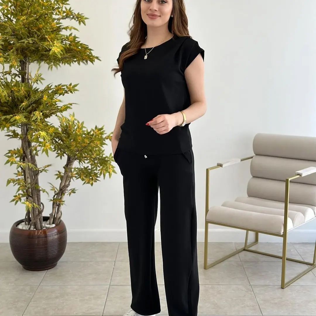 Black 2-piece co-ord set with short-sleeve top and matching wide-leg trousers