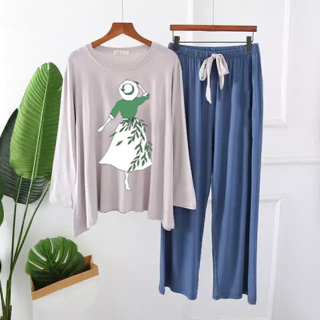 Printed loungewear set with light lilac long-sleeve top and blue drawstring pants