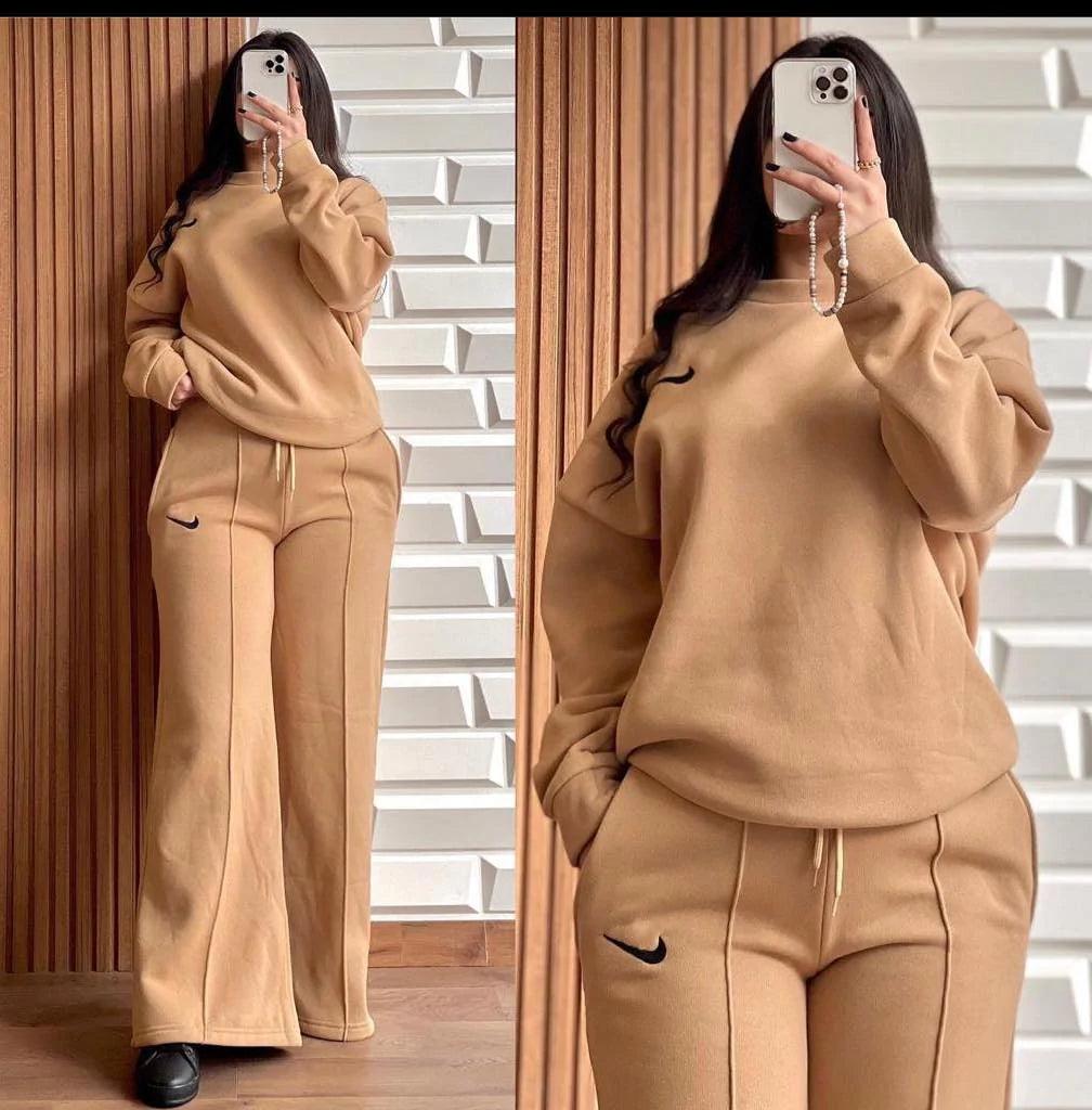 Camel two-piece lounge set with hooded sweatshirt and wide-leg pants, drawstring waist.