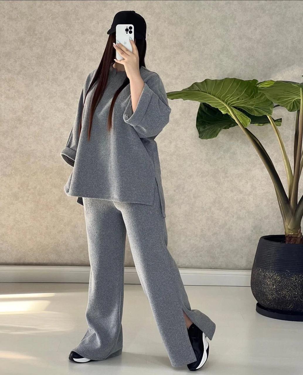 Grey two-piece outfit with V-neck long-sleeve top and wide-leg pants