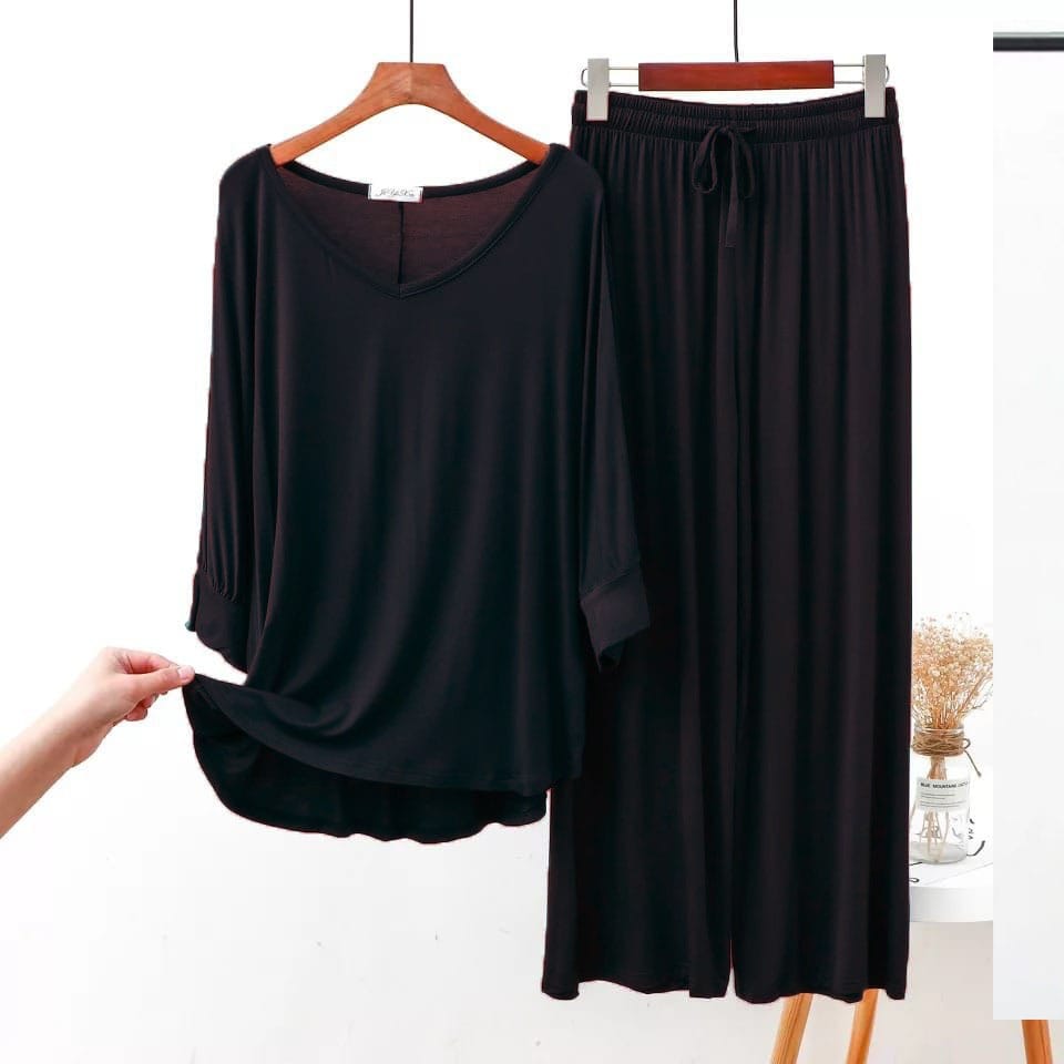 Black V-neck lounge set: long-sleeve top and drawstring wide-leg pants, 2-piece.