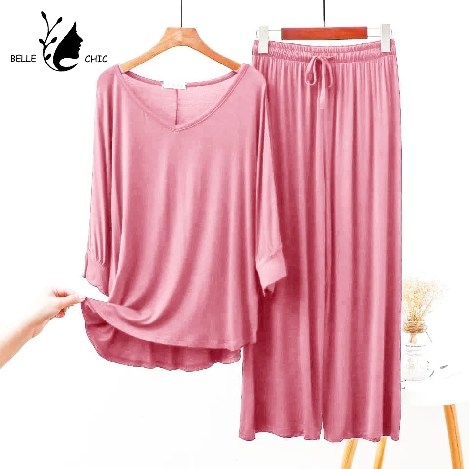 Light pink V-neck lounge set: long-sleeve top and drawstring wide-leg pants, 2-piece.