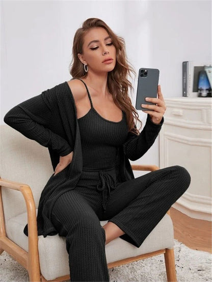 Black 3-piece lounge set: ribbed cami top, long sleeve shrug, drawstring trousers