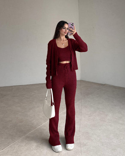 Maroon ribbed knit set with cropped top, cardigan, and high-rise straight pants.