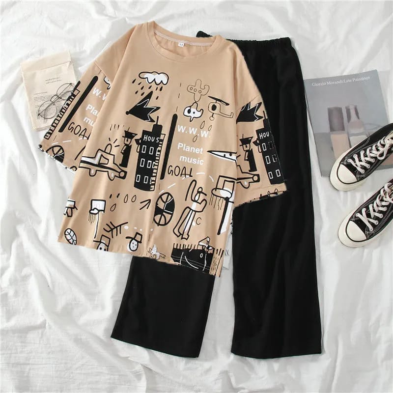 Ladies printed PJ set: beige long-sleeve top and black pajama pants