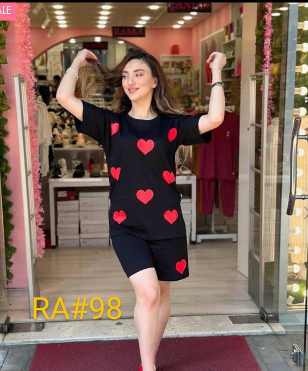 Black heart-print short sleeve pajama set with matching shorts