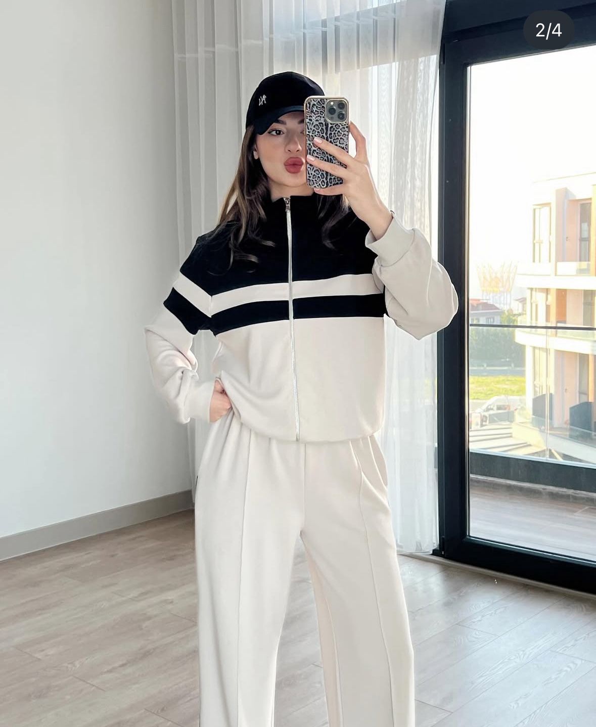 Zip-up track jacket and wide-leg pants set, black and white striped waistband