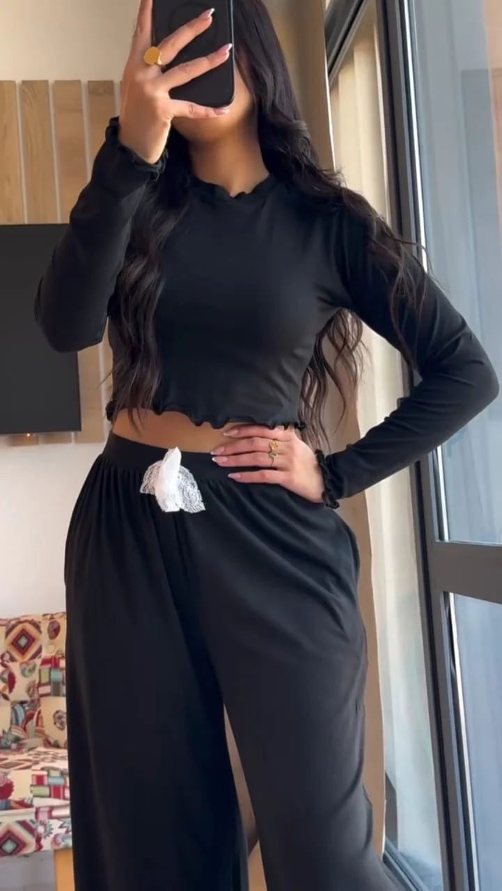Black long-sleeve crop top and wide-leg loungewear pants with elastic waist