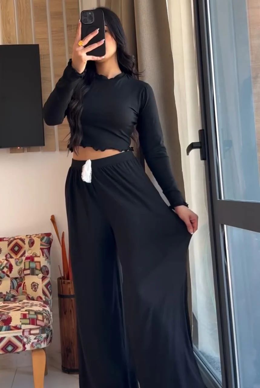 Black long-sleeve crop top and wide-leg loungewear pants, high waist and drawstring