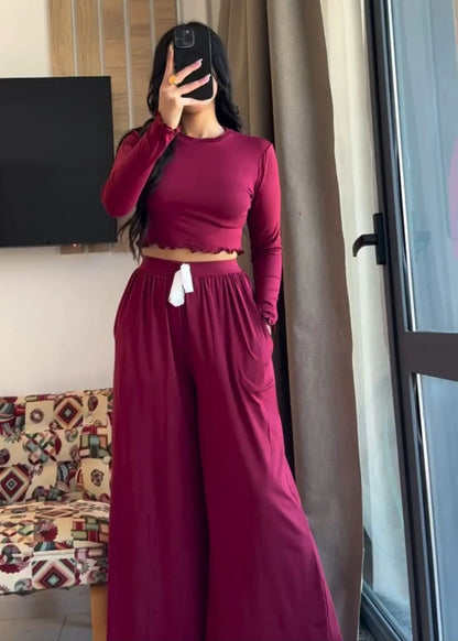 Maroon long-sleeve crop top and wide-leg loungewear pants with elastic waist