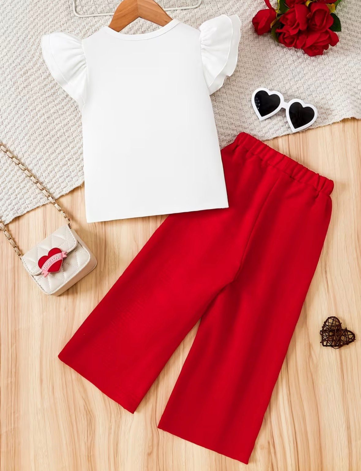 Girls red-and-white outfit set: white puff-sleeve top and red wide-leg pants